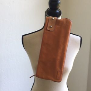 Very cool women’s Kooba clutch